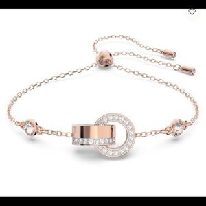 Dextera bracelet Interlocking loop, White, Rose gold-tone plated from swarovski